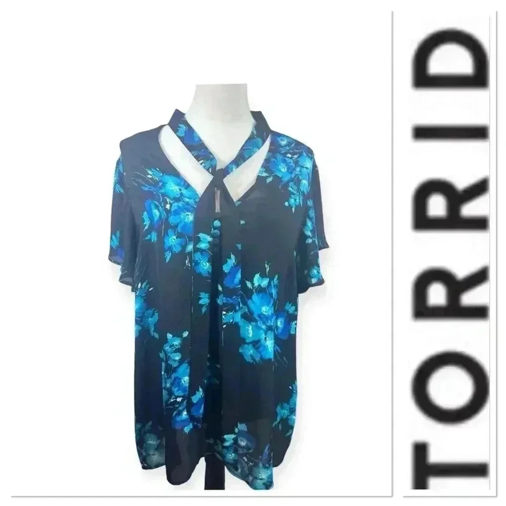 Torrid black top with blue floral print and tie at neck size 2-2X/18-20